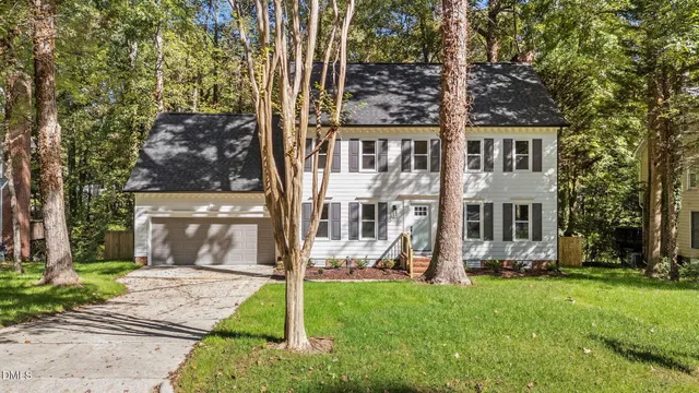 front view of a house with a yard