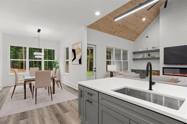 a very nice looking kitchen with a large window