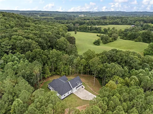 a view of a lake with a yard