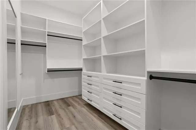 a view of an empty walk in closet