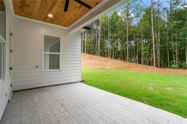 a view of a field with an ocean