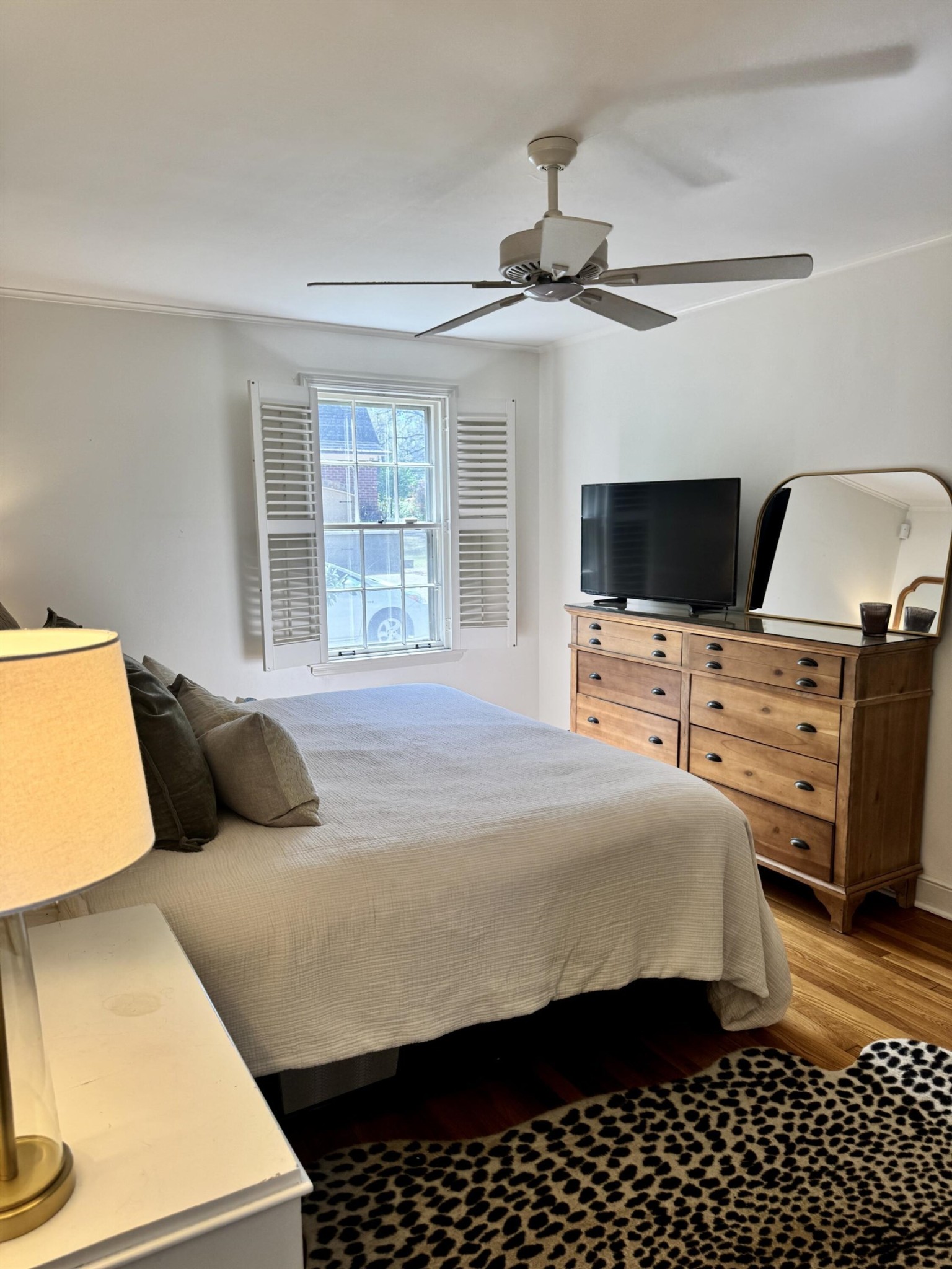 240 Avon Road Memphis, TN 38117 - Photo 13 of 27 a bedroom with a bed and flat screen tv