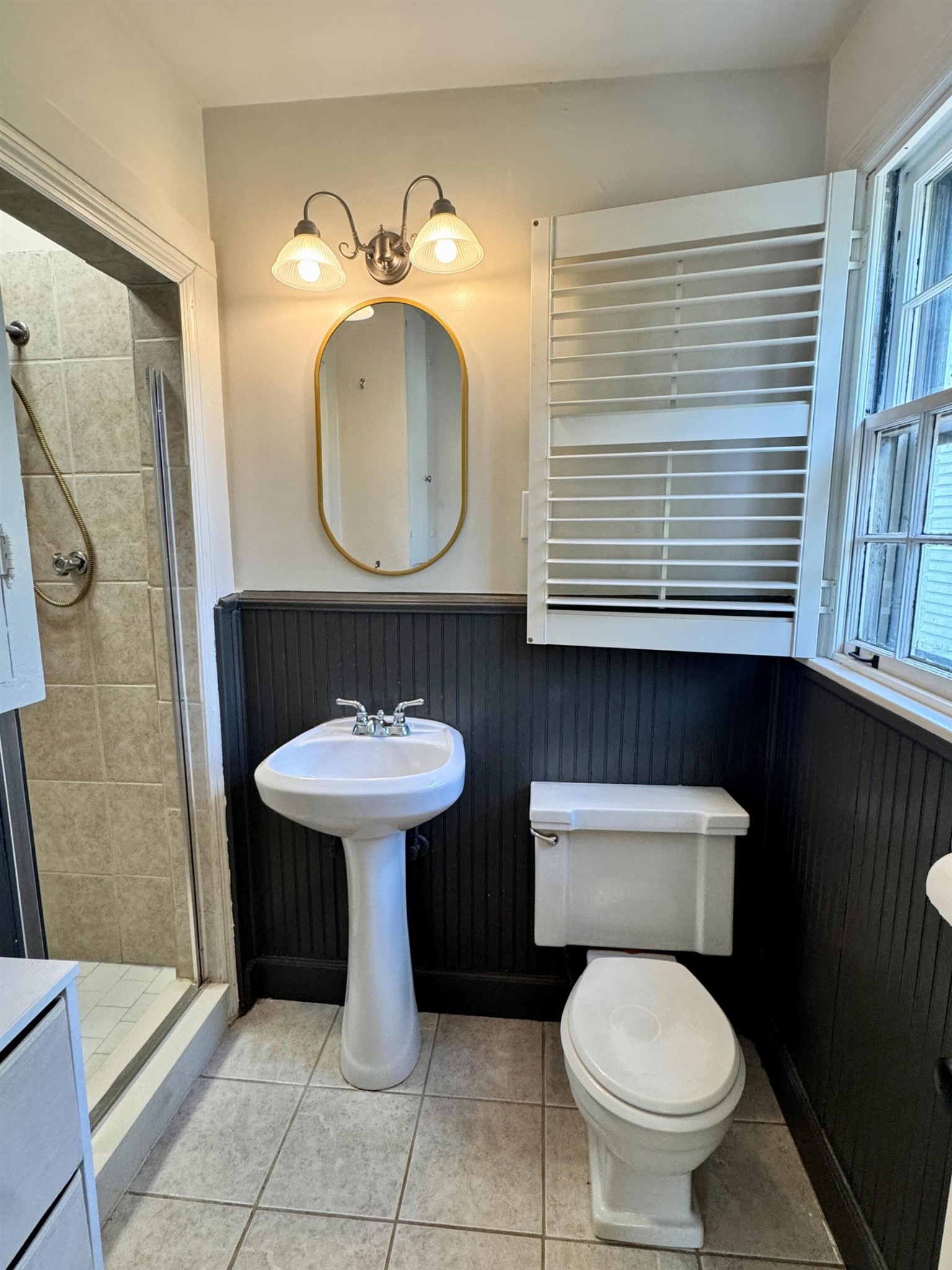 240 Avon Road Memphis, TN 38117 - Photo 14 of 27 a bathroom with a toilet sink and mirror