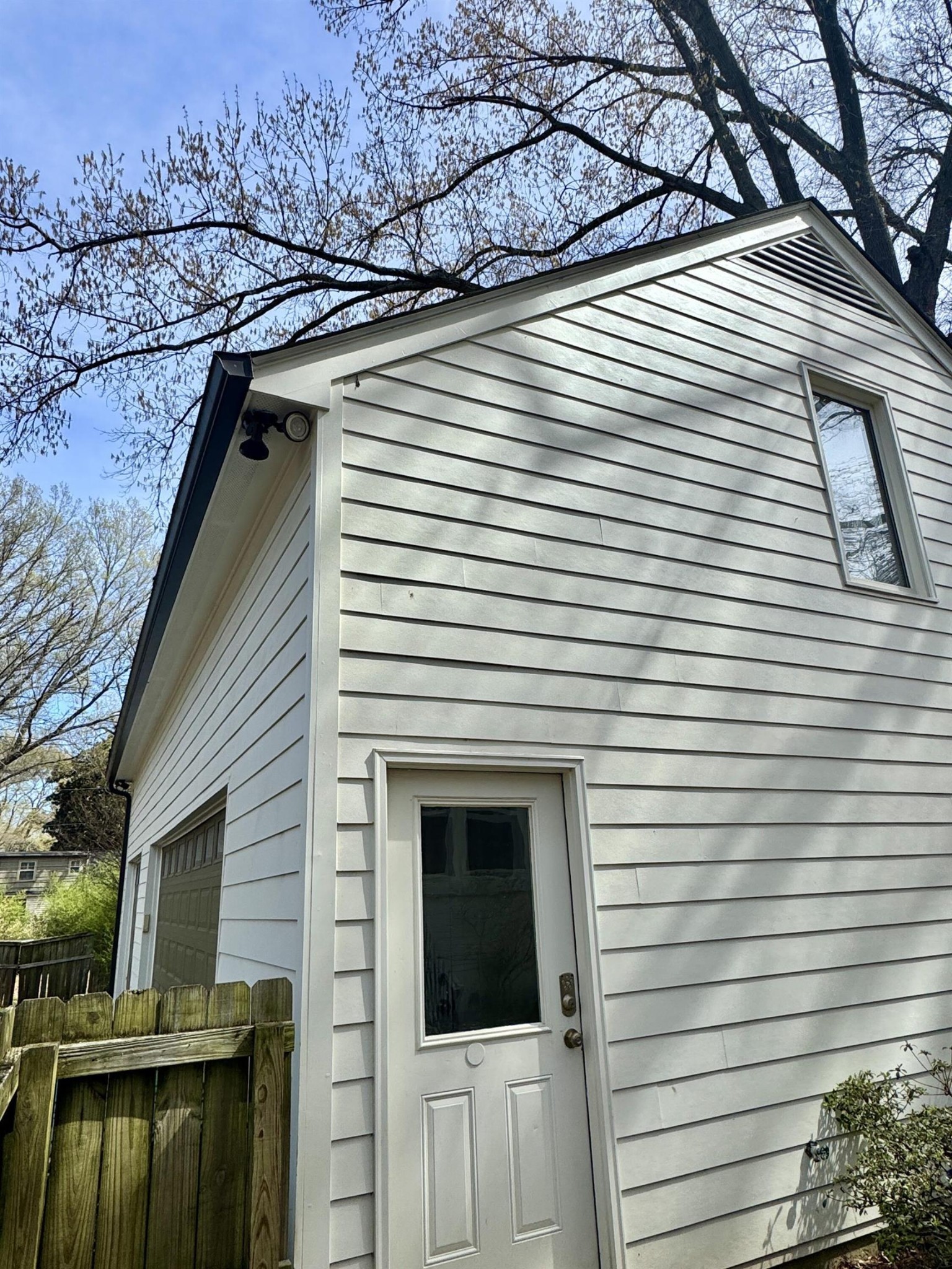 240 Avon Road Memphis, TN 38117 - Photo 23 of 27 a view of a house with a door and a tree