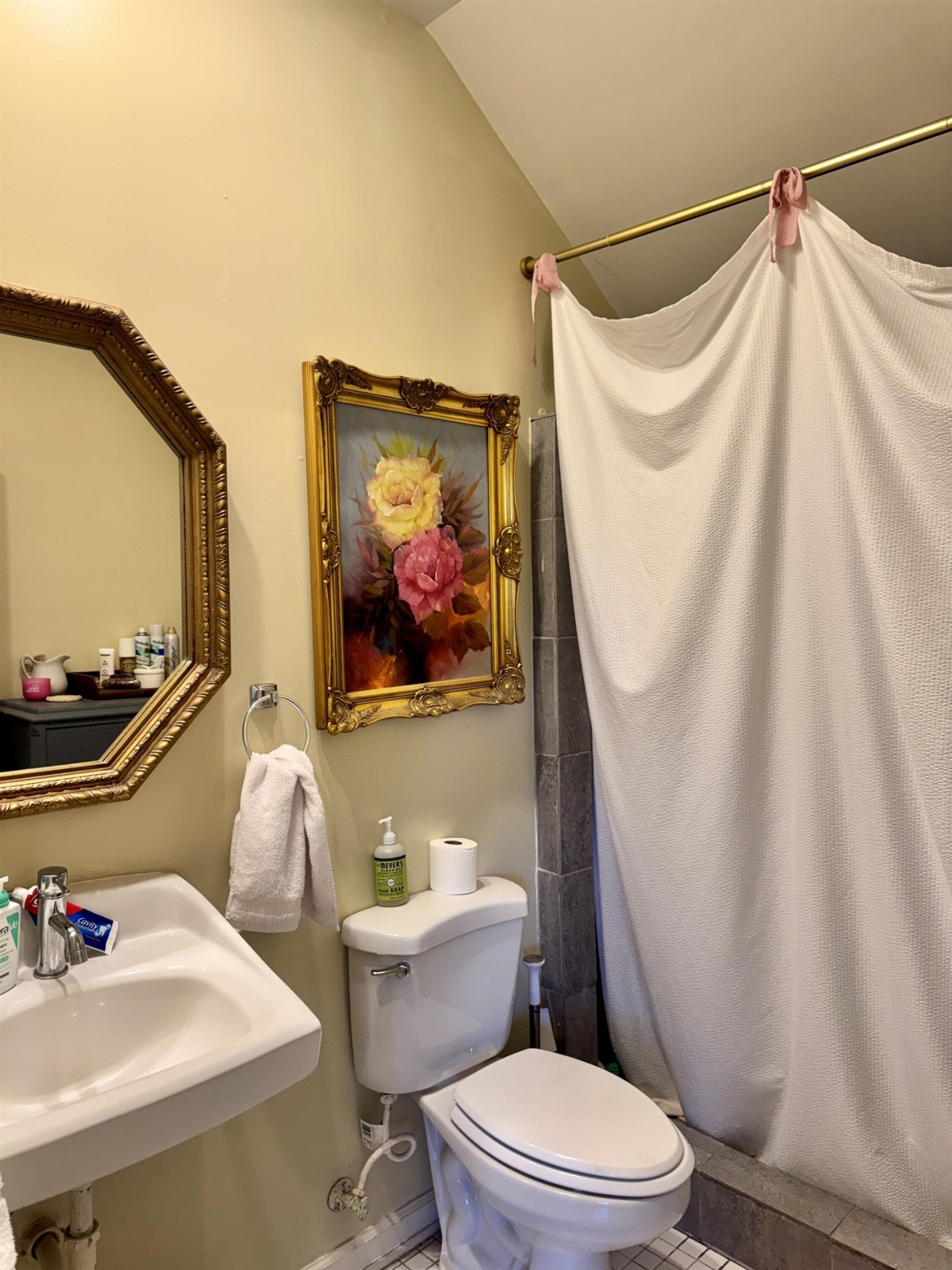 240 Avon Road Memphis, TN 38117 - Photo 27 of 27 a bathroom with a sink toilet and mirror