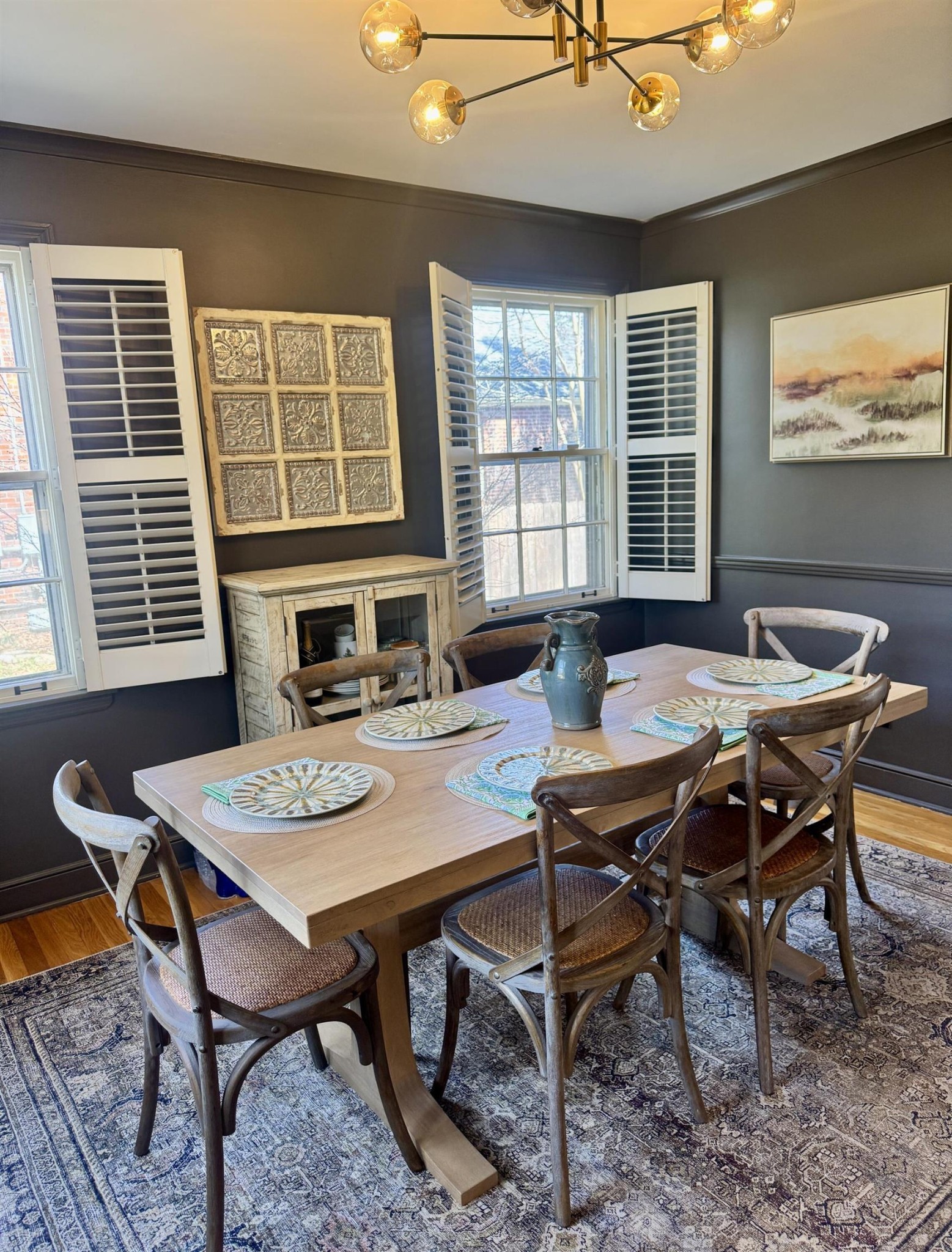 240 Avon Road Memphis, TN 38117 - Photo 4 of 27 a dining room with furniture a rug and wooden floor