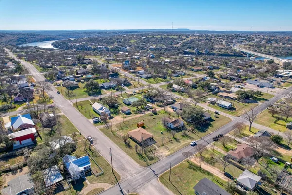 a front view of a building with garden