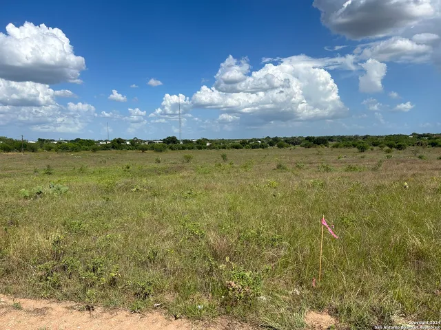 a view of a lake and sunset