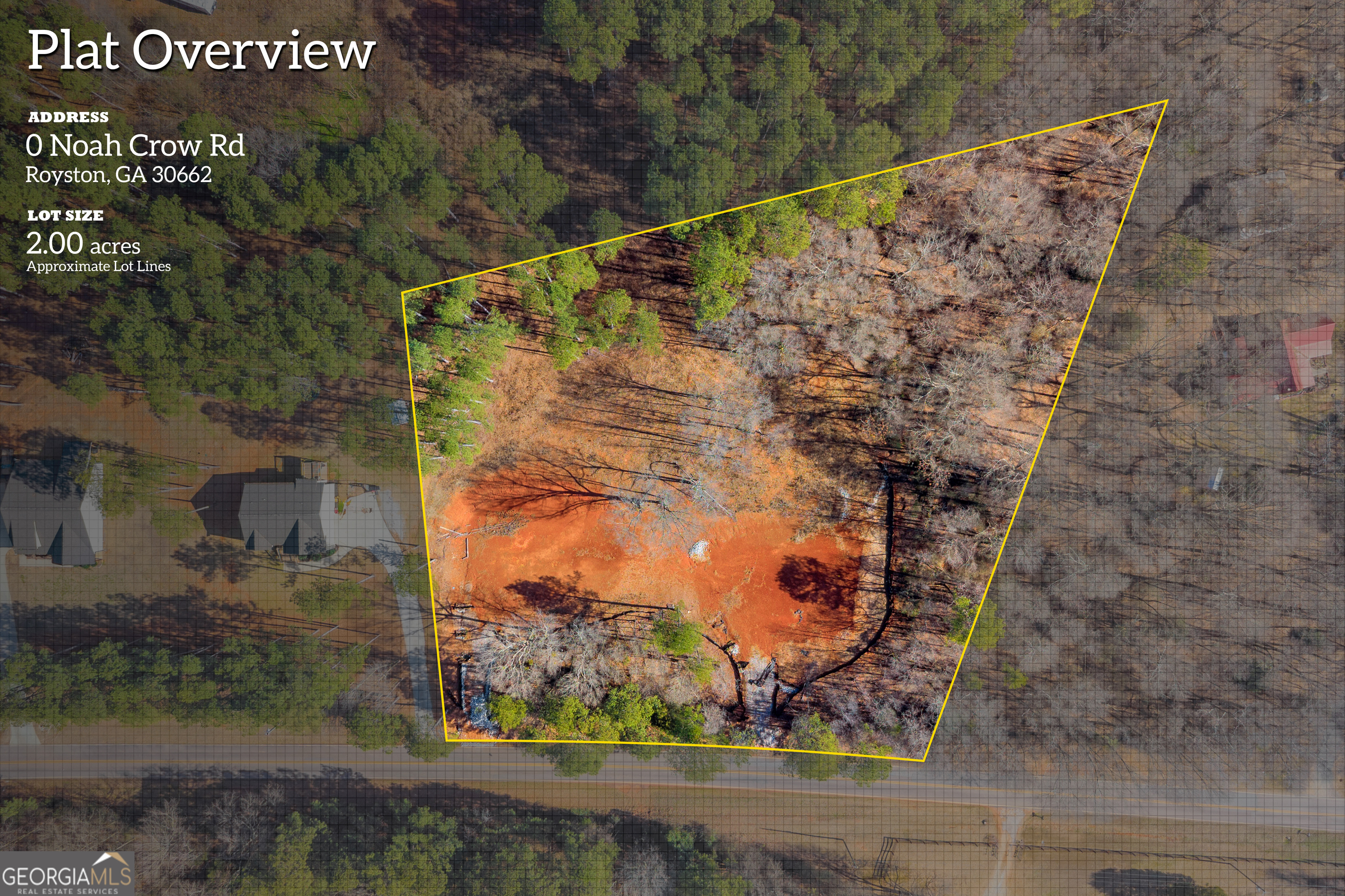 a view of a tree with a yard of the house