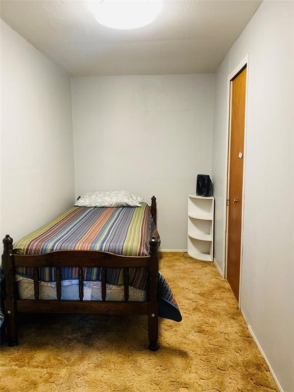 806 North 10th Street Haskell, TX 79521 - Photo 11 of 16 a room with a table