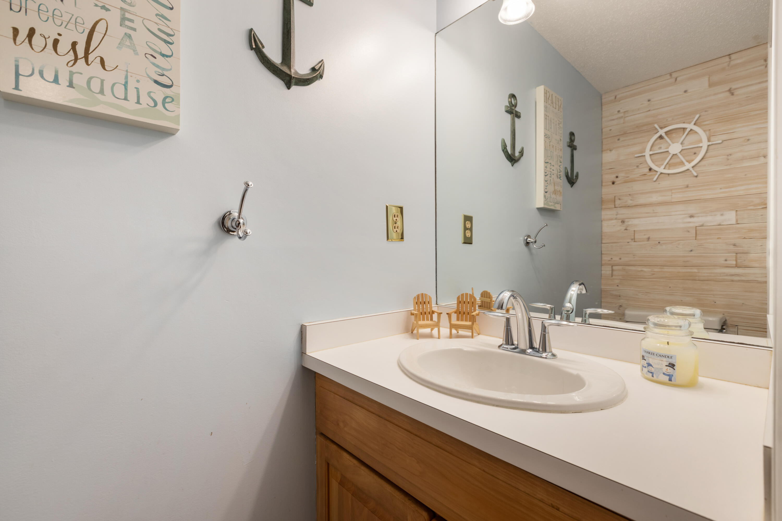 2806 Maple Brook Road Bellingham, MA 02019 - Photo 16 of 38 a bathroom with a sink and a mirror