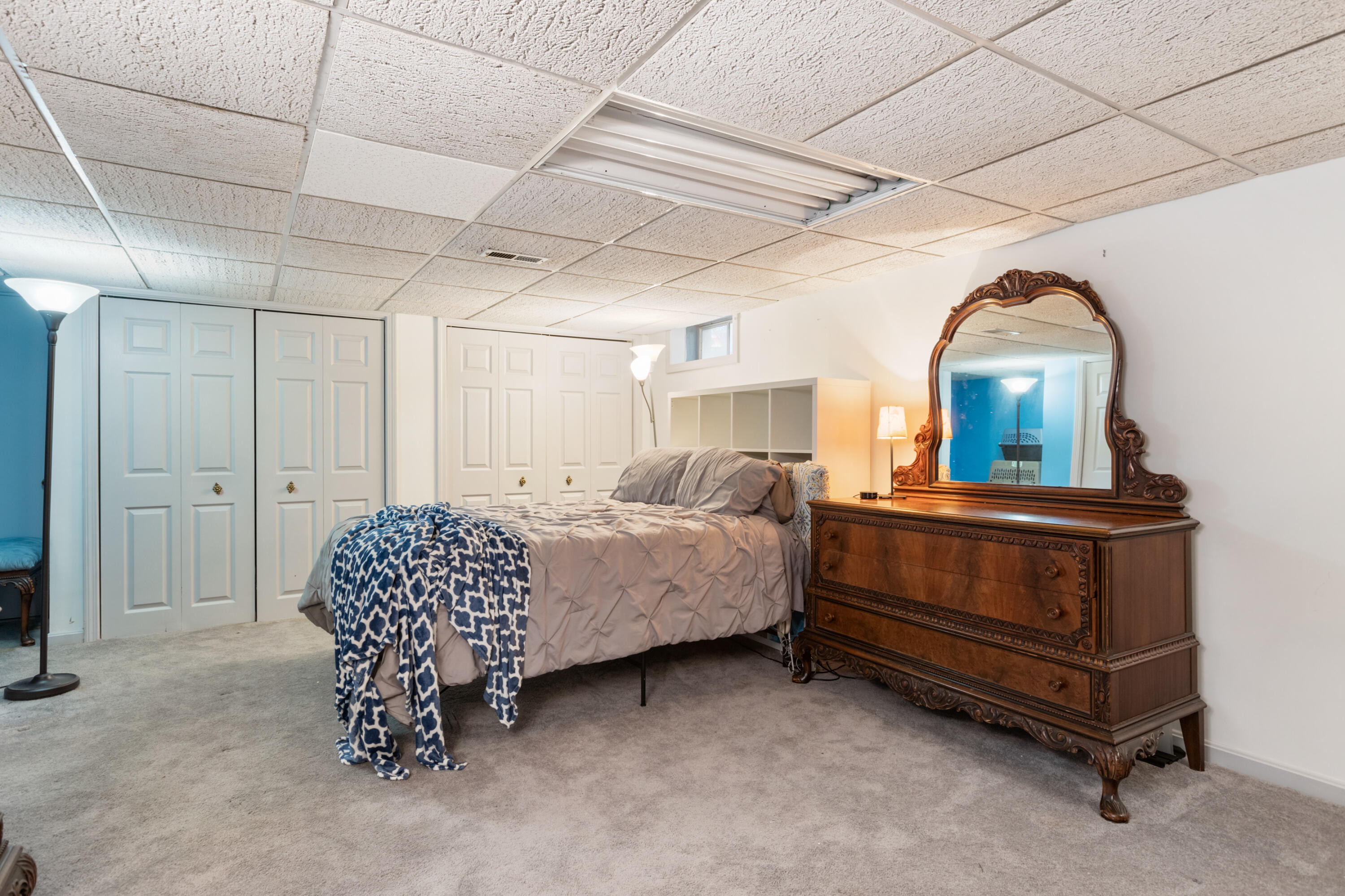 2806 Maple Brook Road Bellingham, MA 02019 - Photo 28 of 38 a living room with a bed furniture and a window
