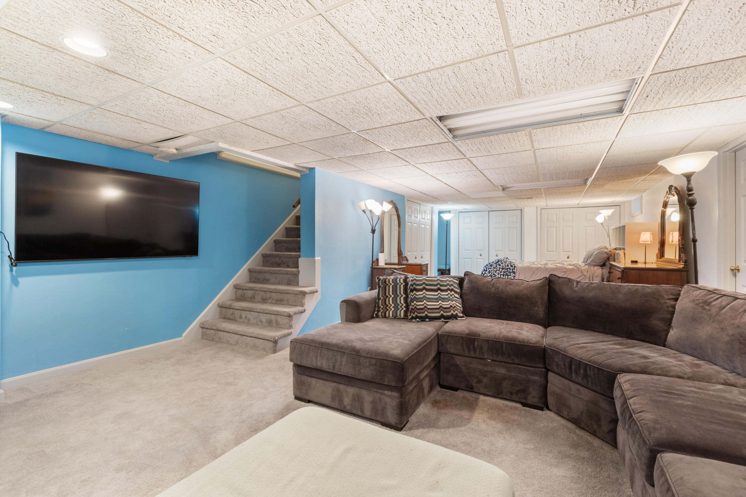 2806 Maple Brook Road Bellingham, MA 02019 - Photo 31 of 38 a living room with furniture and a flat screen tv