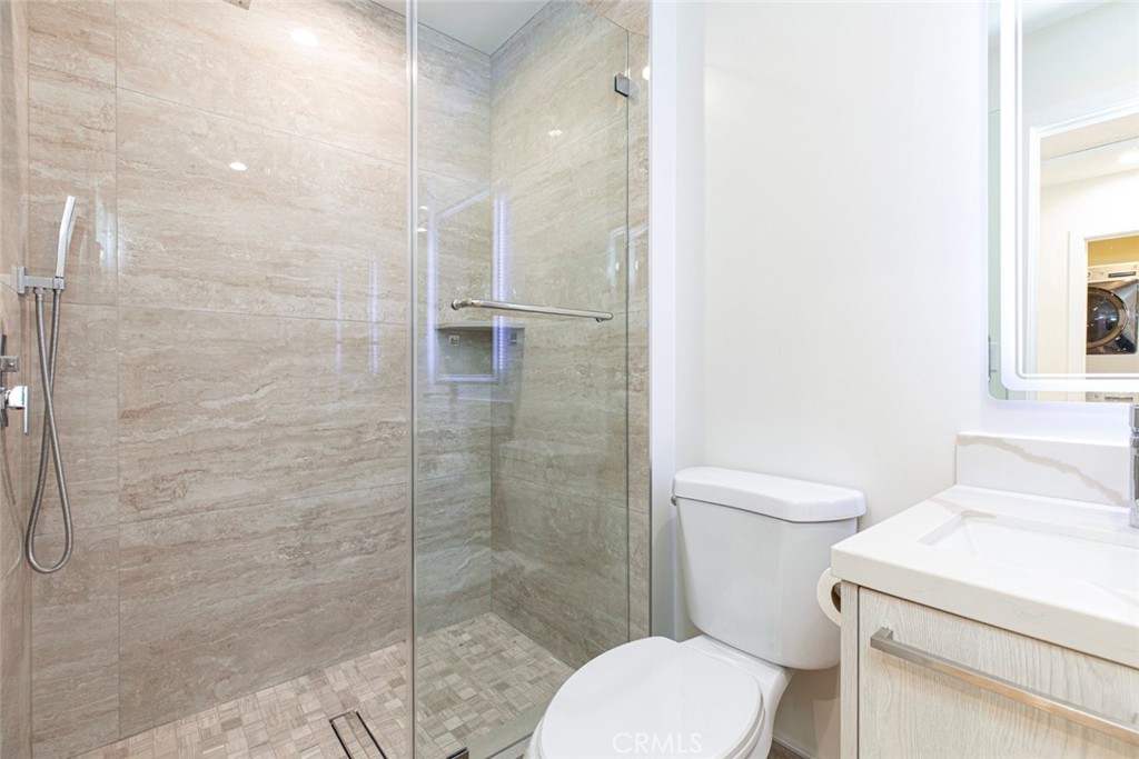 7103 Greeley Street Tujunga, CA 91042 - Photo 12 of 33 a bathroom with a toilet and a shower
