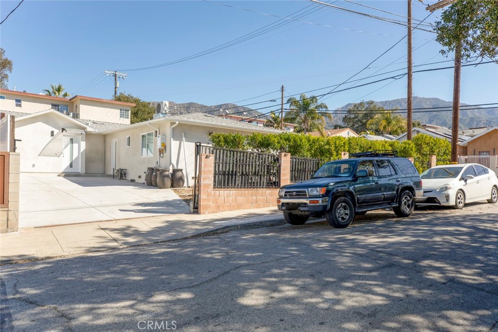 7103 Greeley Street Tujunga, CA 91042 - Photo 21 of 33 a view of a car is parked in front of a house