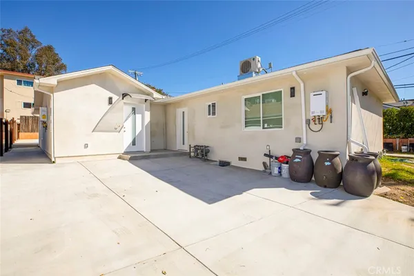 a view of a back yard of the house