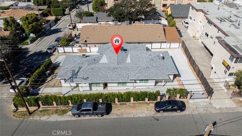 7103 Greeley Street Tujunga, CA 91042 - Photo 31 of 33 an aerial view of a pool with tables and chairs