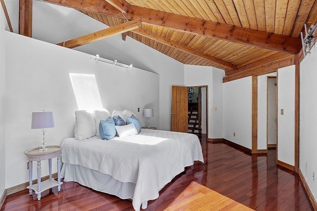 153 Middle Road Boxborough, MA 01719 - Photo 17 of 36 a bedroom with bed and wooden floor