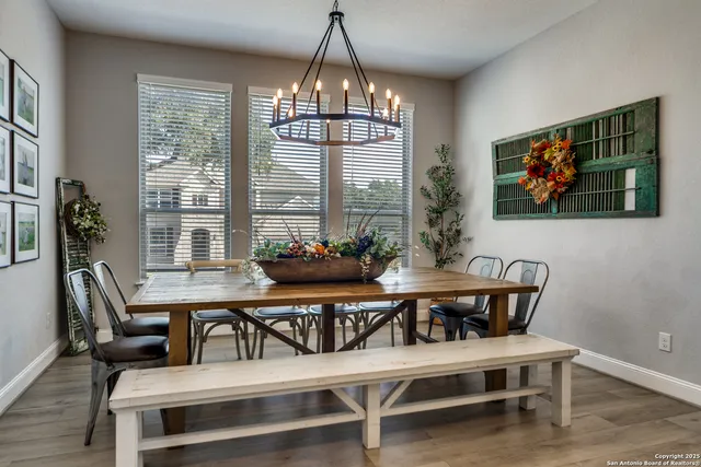 a view of a dining room with furniture window and outside view