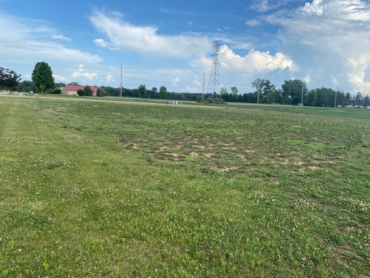 a view of a lake with a big yard