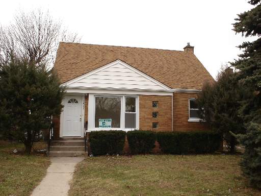 1486 State Line Road Calumet City, IL 60409 - Photo 1 of 1 a front view of a house with a yard