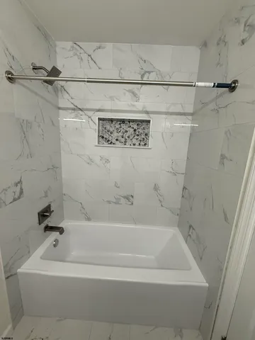 a bathroom with a bathtub