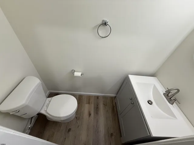 a bathroom with a toilet and a sink