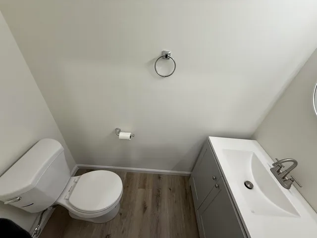a bathroom with a toilet and a sink