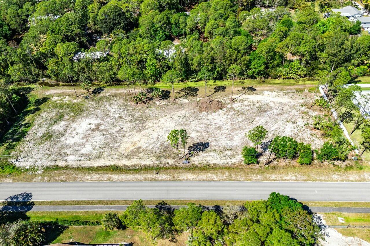 7160 Mellen Lane North Jupiter, FL 33478 - Photo 15 of 15 a view of an ocean beach