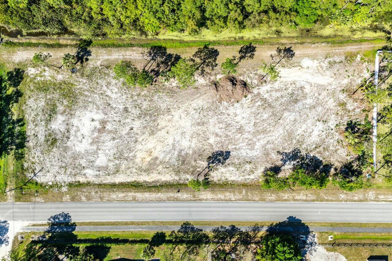 7160 Mellen Lane North Jupiter, FL 33478 - Photo 2 of 15 a view of an ocean and beach
