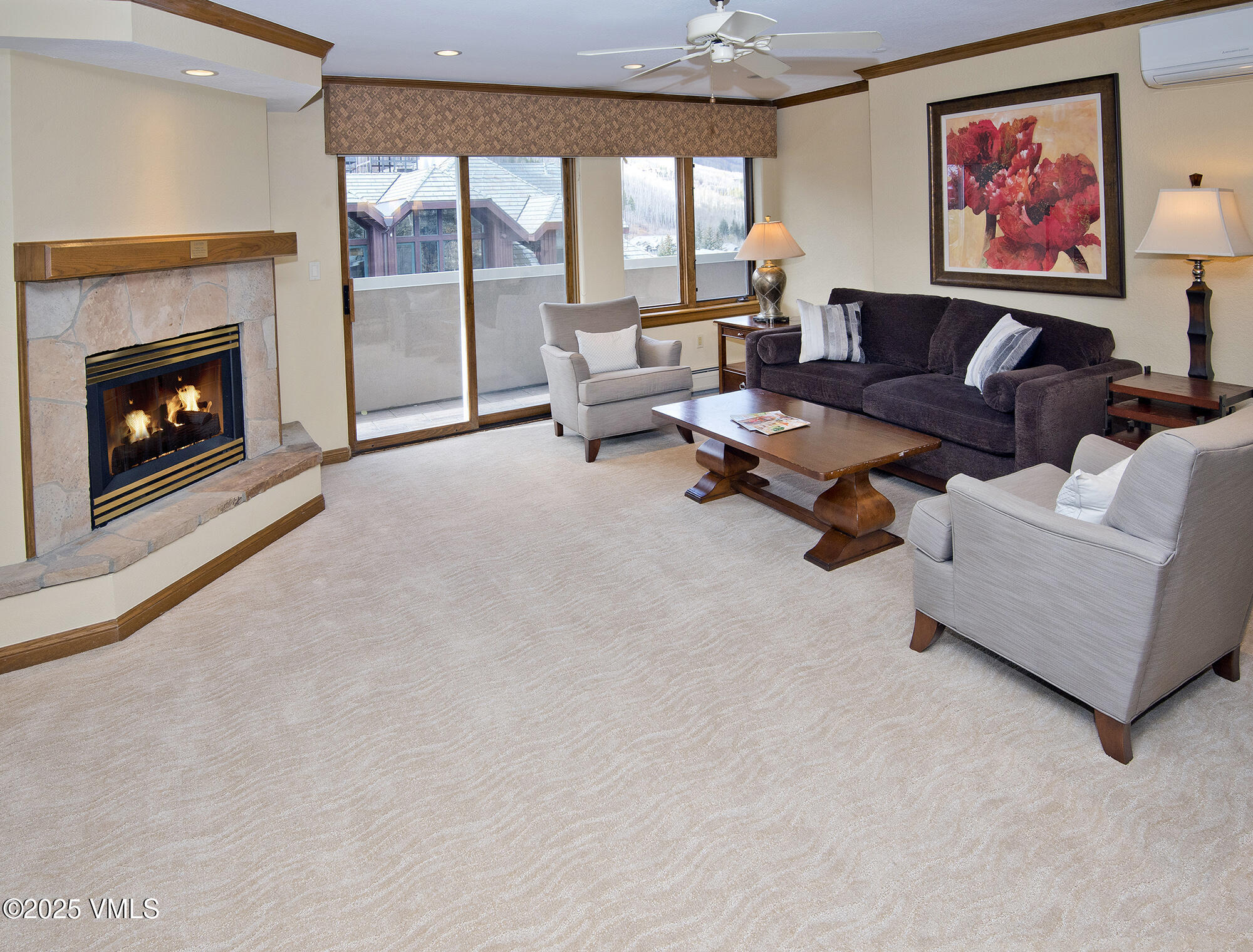 210 Offerson Road, Unit 321 Beaver Creek, CO 81620 - Photo 13 of 30 a living room with furniture and a fireplace