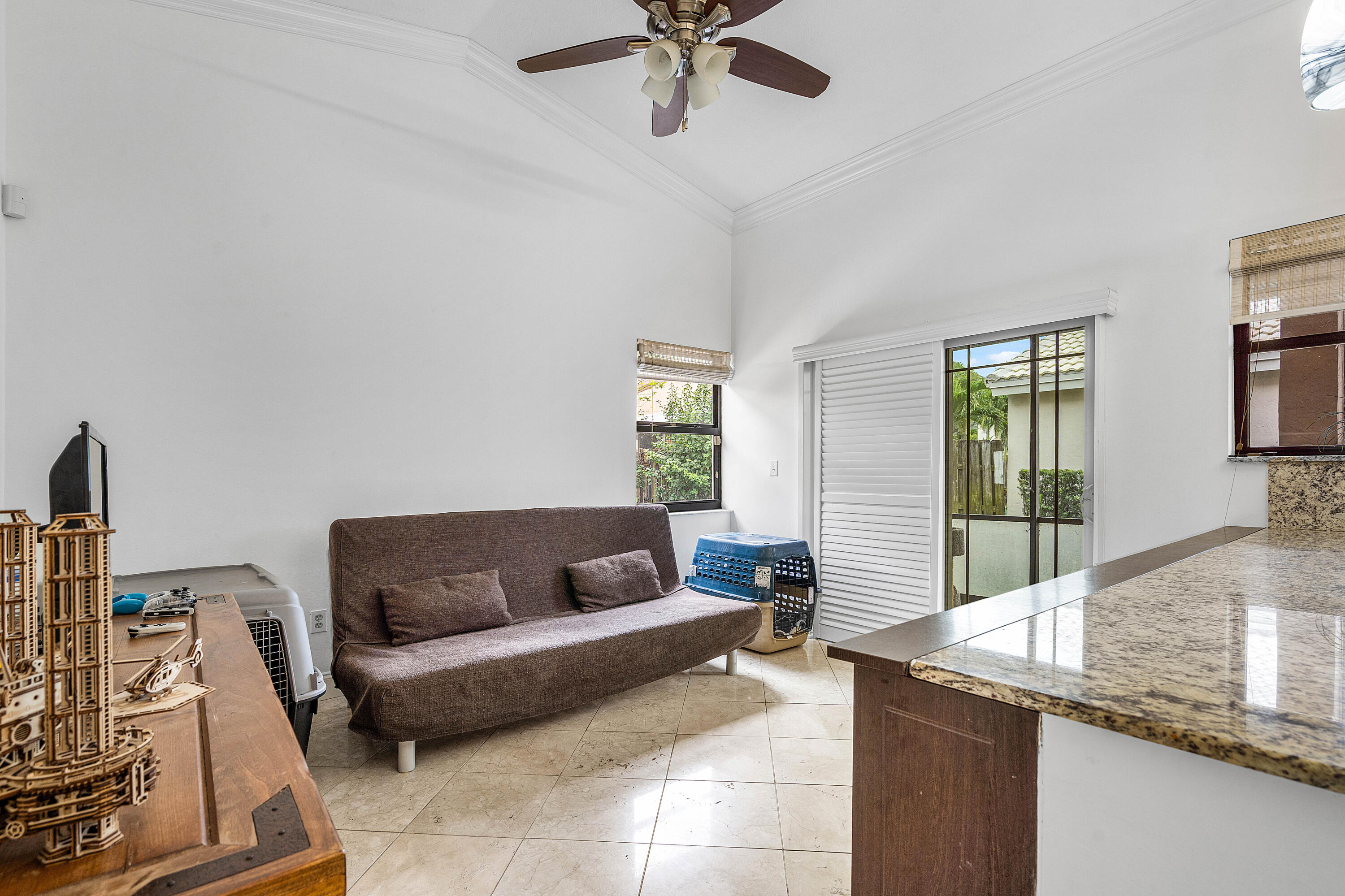 6100 Manchester Lane Davie, FL 33331 - Photo 16 of 30 a living room with furniture and a window