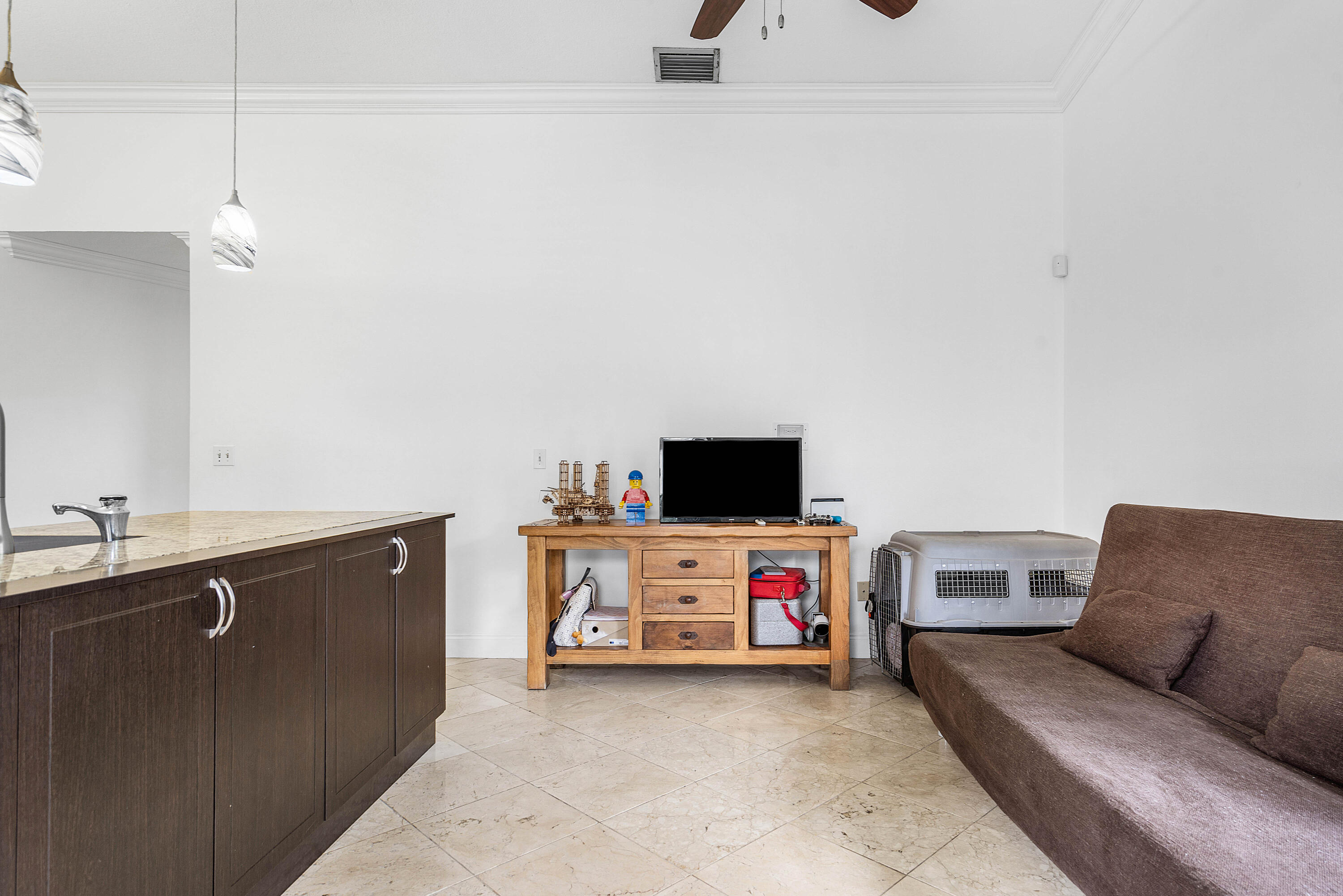 6100 Manchester Lane Davie, FL 33331 - Photo 17 of 30 a view of a livingroom with furniture and a flat screen tv