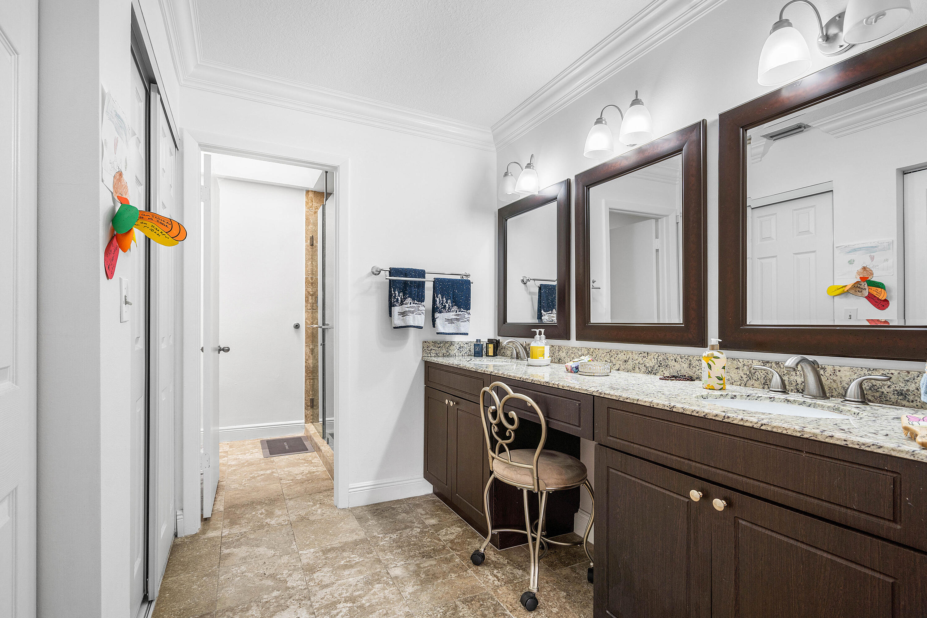 6100 Manchester Lane Davie, FL 33331 - Photo 19 of 30 a spacious bathroom with a sink double vanity granite and a mirror