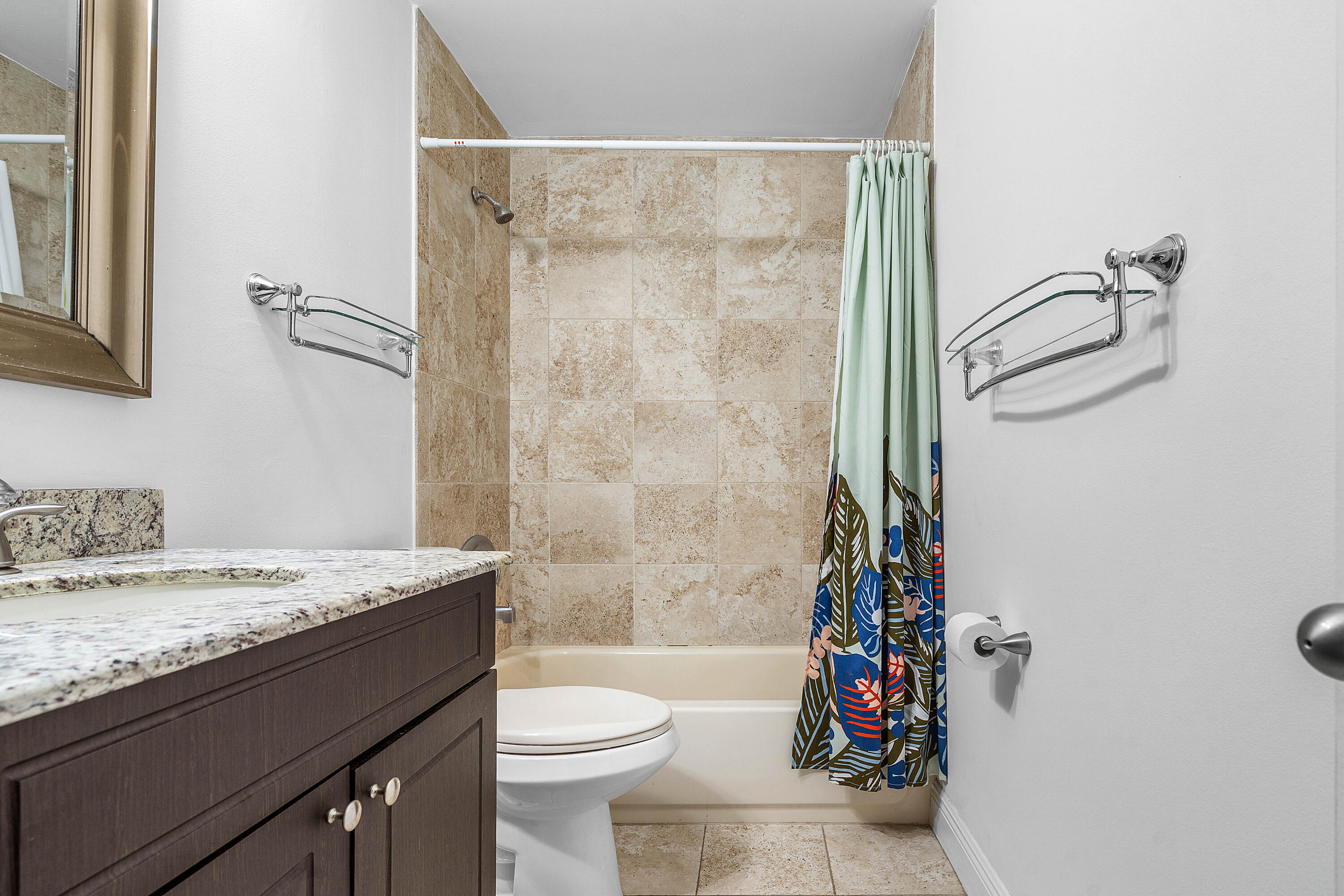 6100 Manchester Lane Davie, FL 33331 - Photo 24 of 30 a bathroom with a granite countertop sink toilet and shower