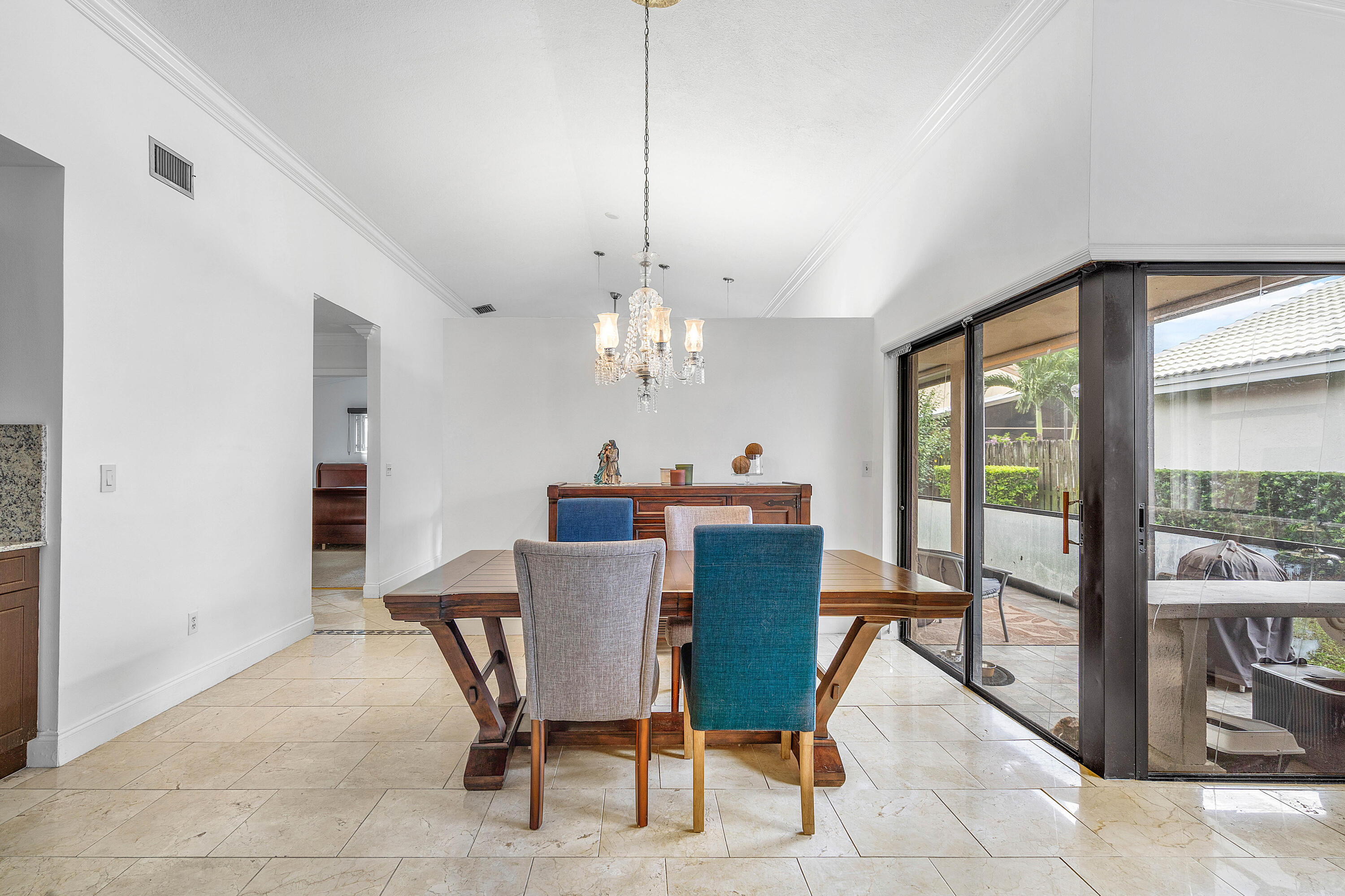 6100 Manchester Lane Davie, FL 33331 - Photo 10 of 30 a view of a dining room with furniture window and outside view