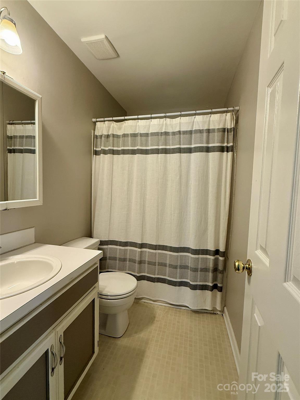 2238 Swain Court Gastonia, NC 28054 - Photo 18 of 27 a bathroom with a sink a toilet and shower