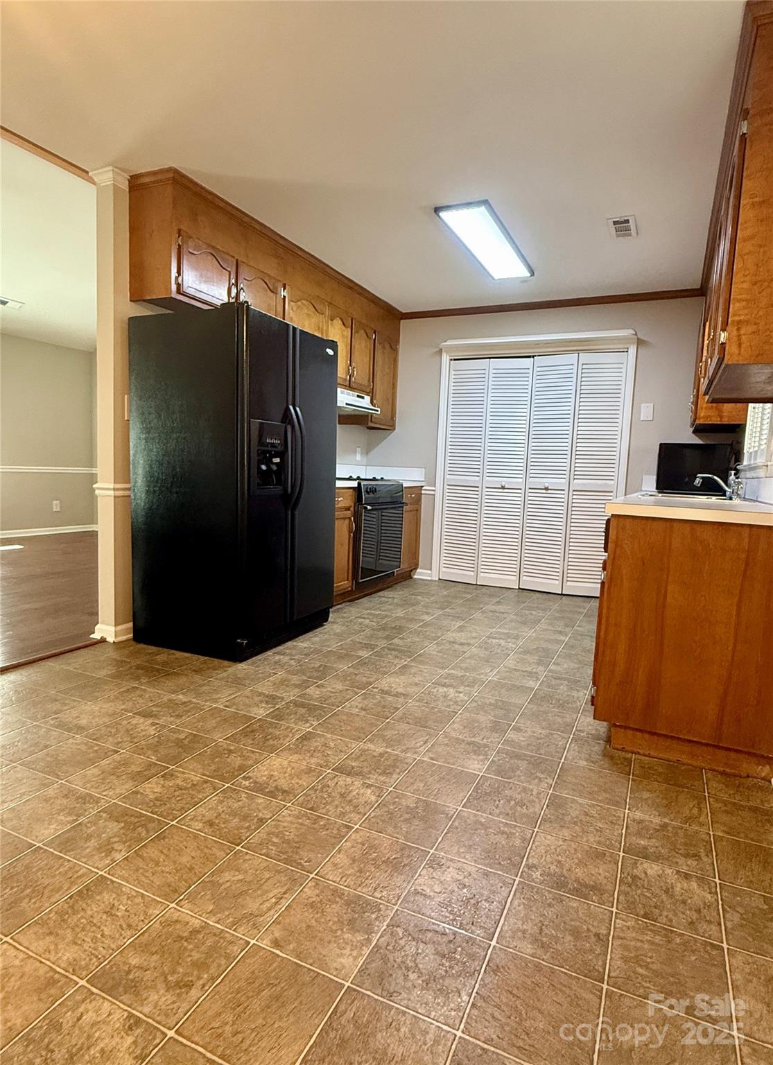 2238 Swain Court Gastonia, NC 28054 - Photo 9 of 27 a view of empty room with a kitchen