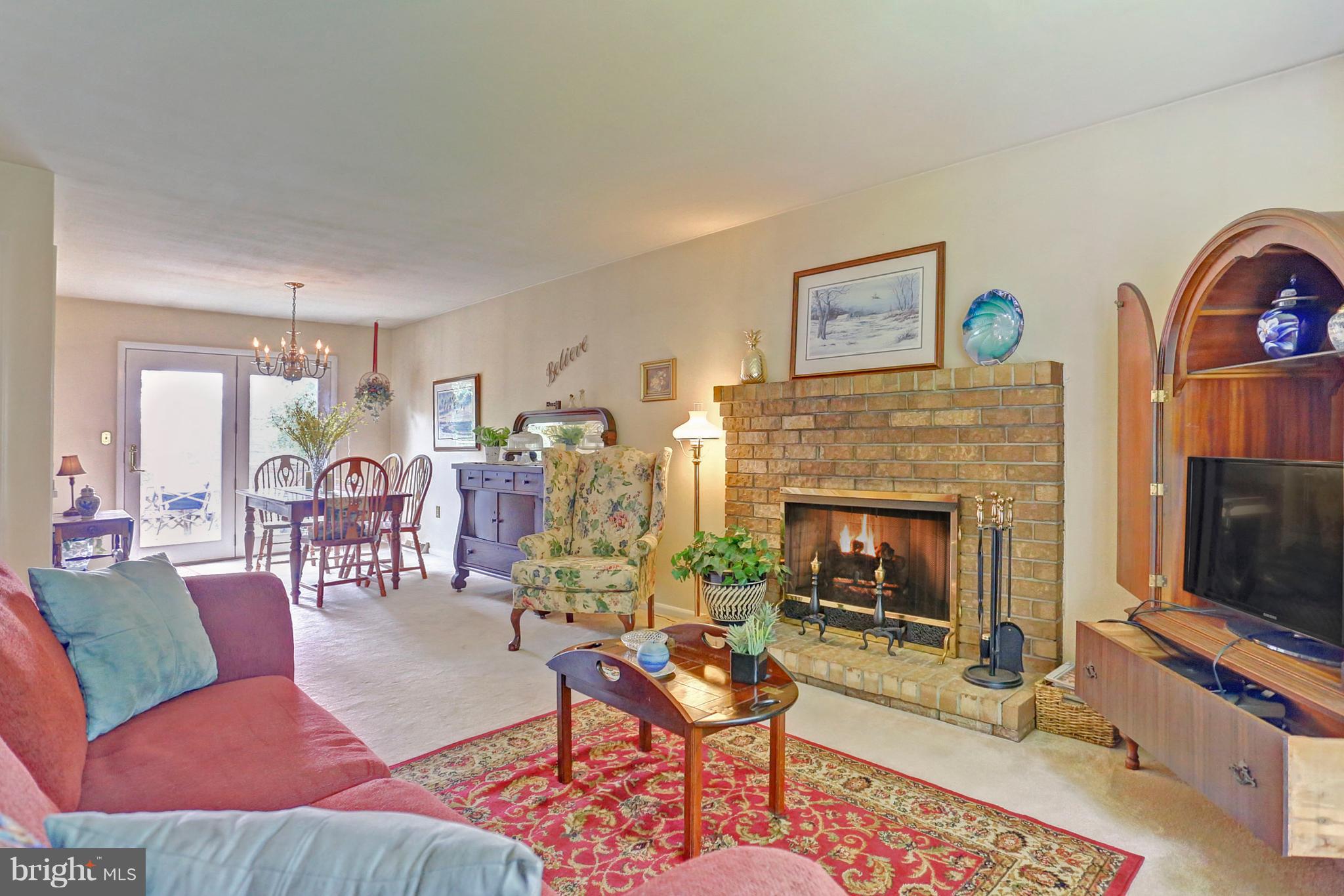 3644 Water Tank Road Manchester, MD 21102 - Photo 2 of 37 a living room with furniture and a fireplace