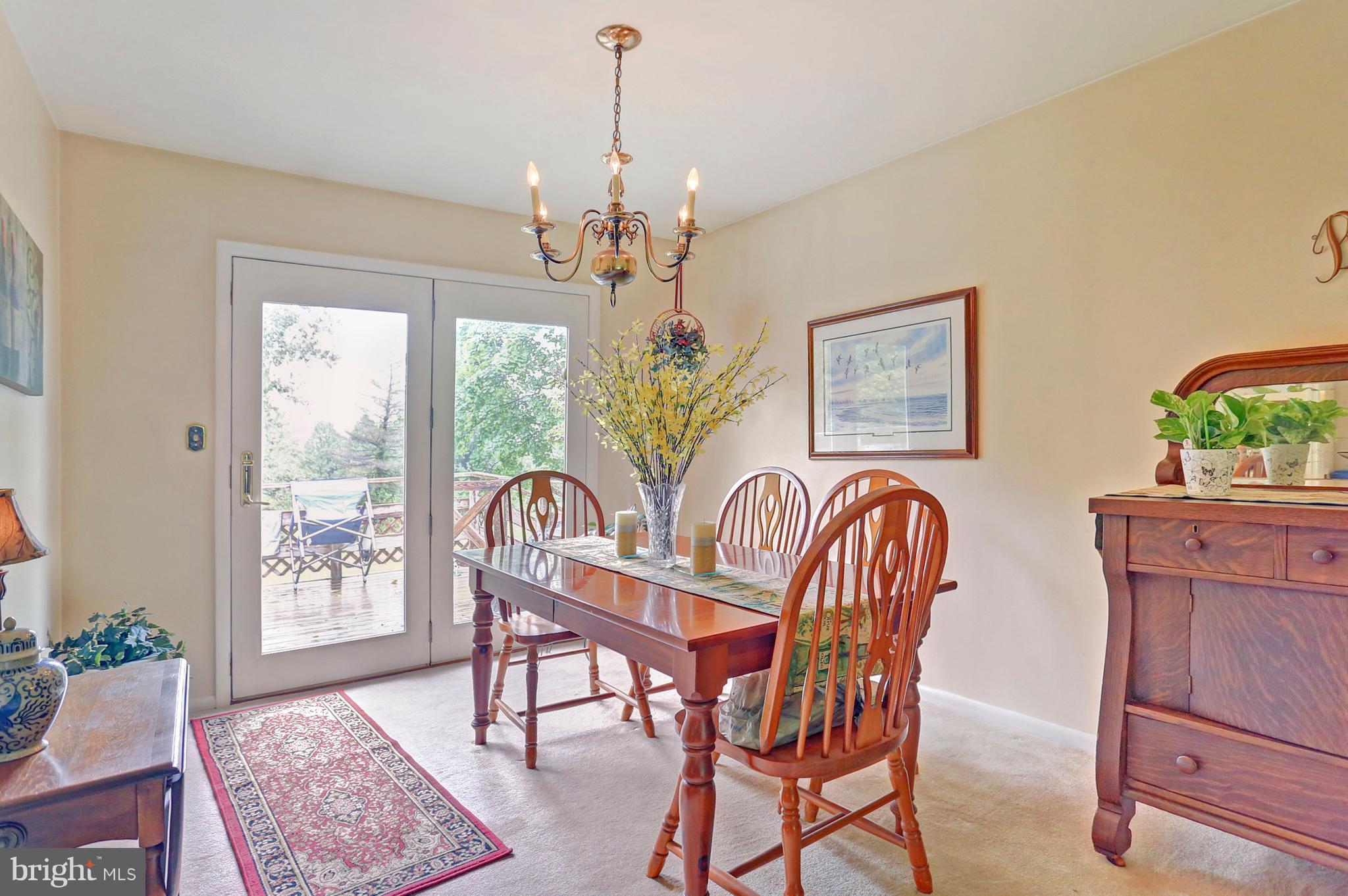 3644 Water Tank Road Manchester, MD 21102 - Photo 4 of 37 a view of a dining room with furniture window and wooden floor