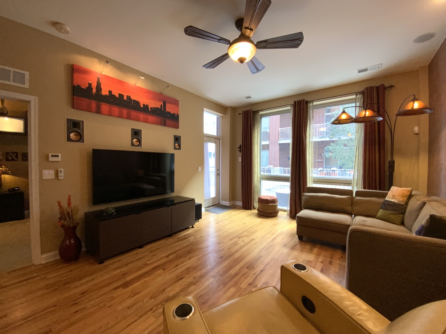 2025 South Indiana Avenue, Unit 209 Chicago, IL 60616 - Photo 21 of 49 a living room with furniture and a flat screen tv