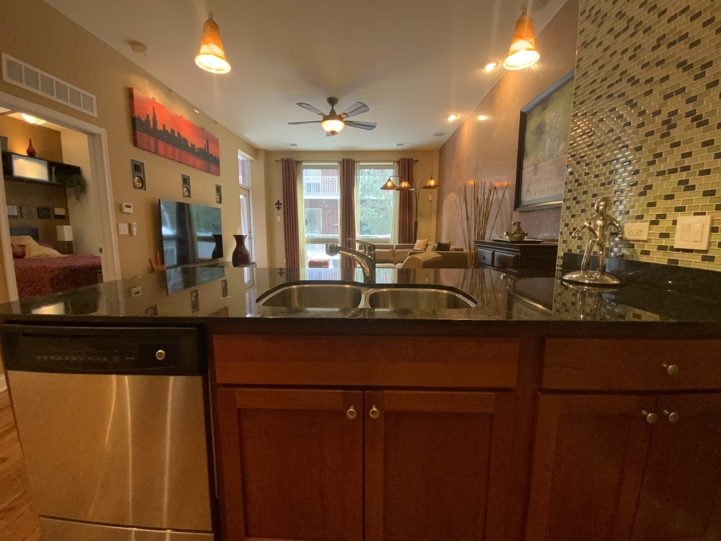 2025 South Indiana Avenue, Unit 209 Chicago, IL 60616 - Photo 37 of 49 a kitchen with stainless steel appliances sink and cabinets