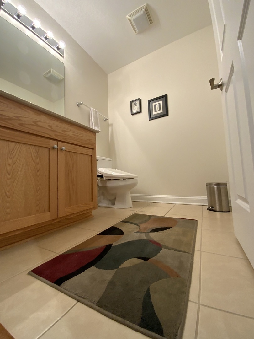 2025 South Indiana Avenue, Unit 209 Chicago, IL 60616 - Photo 40 of 49 a bedroom with a bed and a cabinets