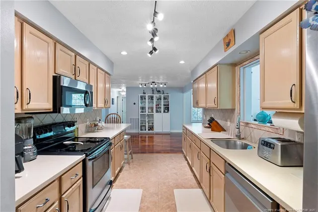 a view of workspace with furniture and natural light