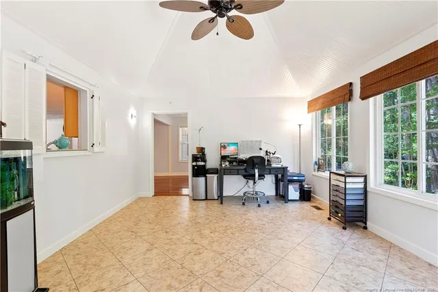 a bathroom with a double vanity sink toilet mirror and bathtub