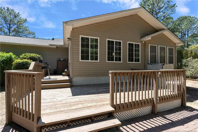 a view of a wooden roof deck