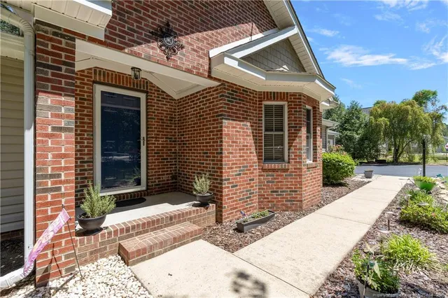 a view of a swimming pool with a lounge chair