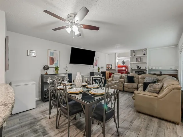 a view of a dining room with furniture