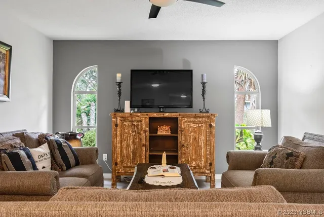 a kitchen with a stove a sink and a refrigerator