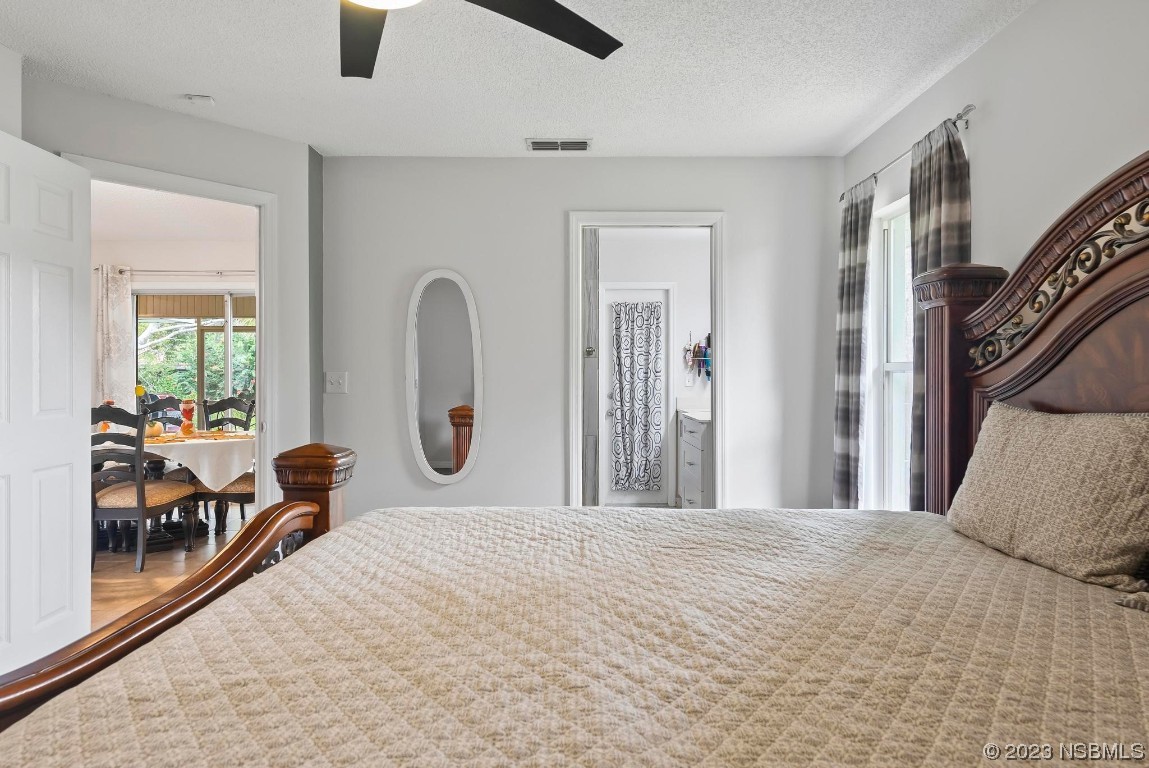 1829 Lime Tree Drive Edgewater, FL 32132 - Photo 33 of 62 a bedroom with furniture and a window